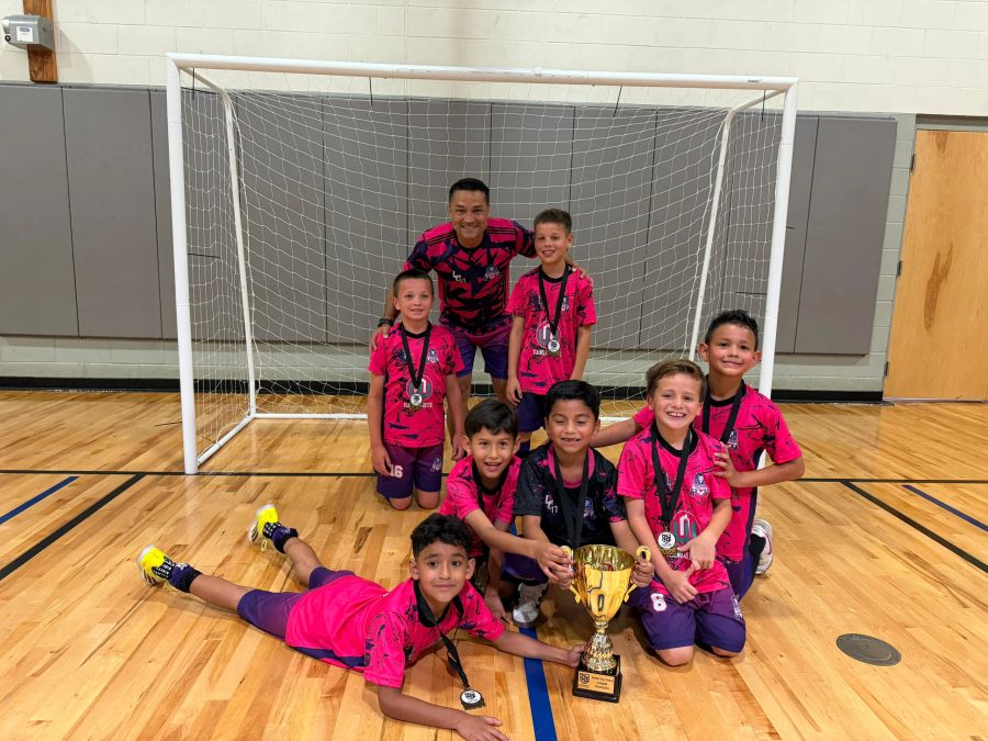 Futsal team celebrating