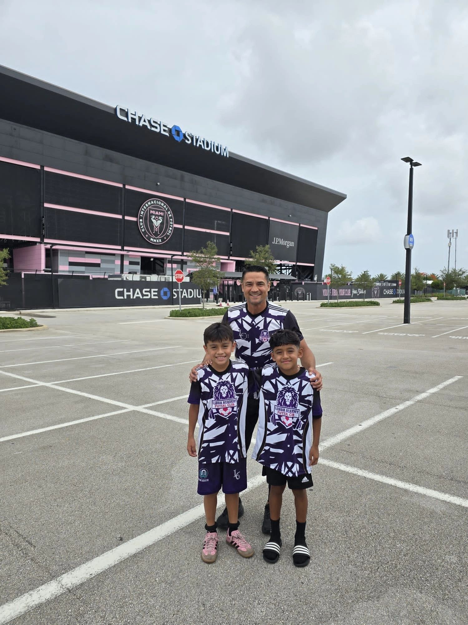 Coach and players at Chase Stadium